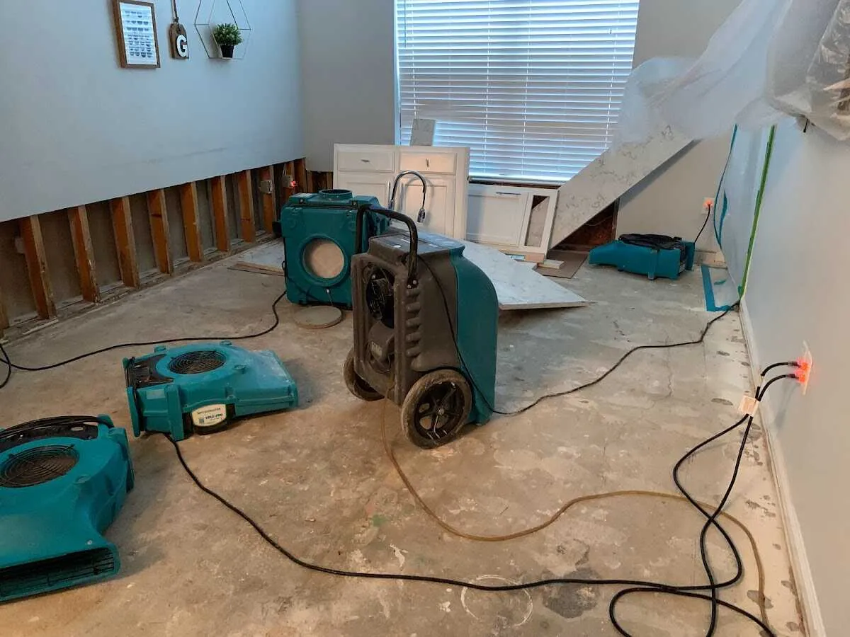 Dehumidifier in flood-cut room for Water Damage Restoration in Modesto